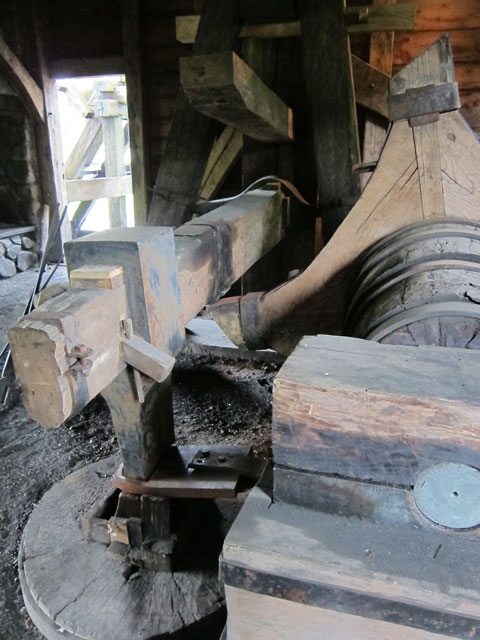 This water driven hammer pounds the cast iron into wrought iron giving it strength.