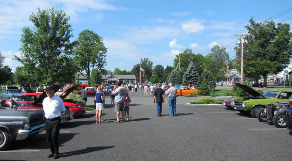 Overall view of the car show looking back at Kringle Kandle Company.