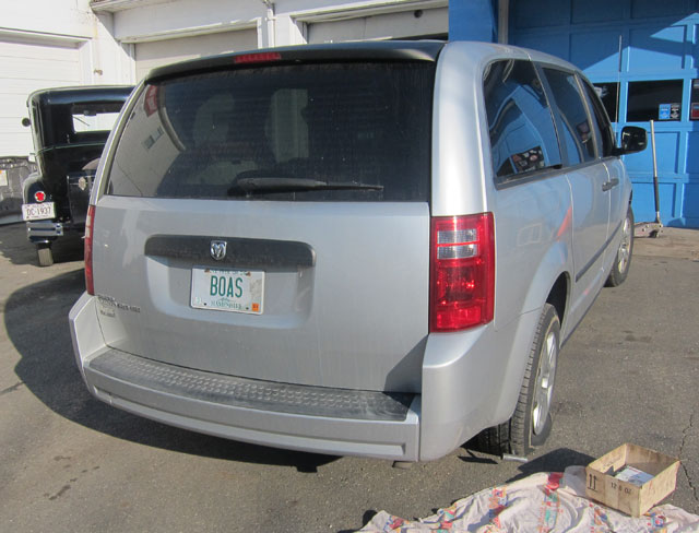 Note tool in rear tire inserting tire plug.  More good timing and good fortune.