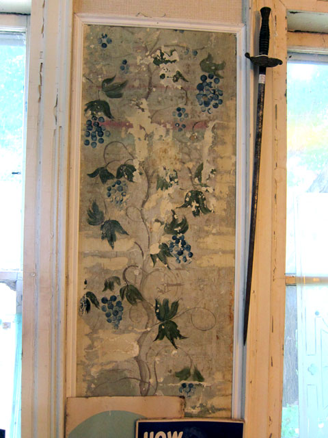 Unusual grapes, possibly helping to identify the itinerant artist.