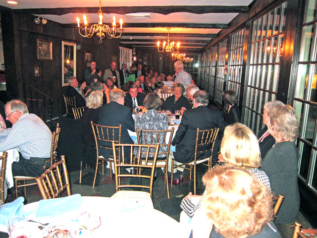 Dick speaking to the class