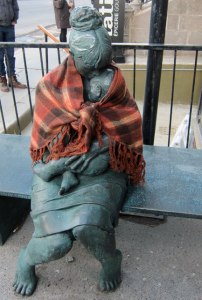Even a statue can get cold, and a kind soul add a shawl to warm it.