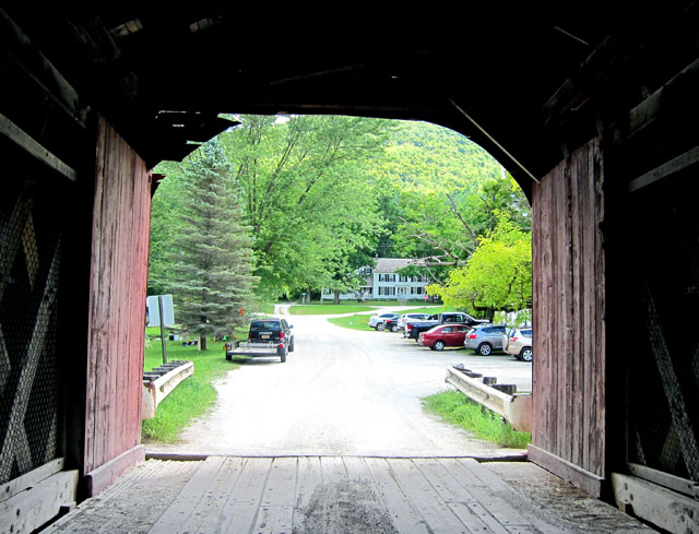 Looking through the West Arlington, Vermont, covered bridge to Norman Rockwell's home.